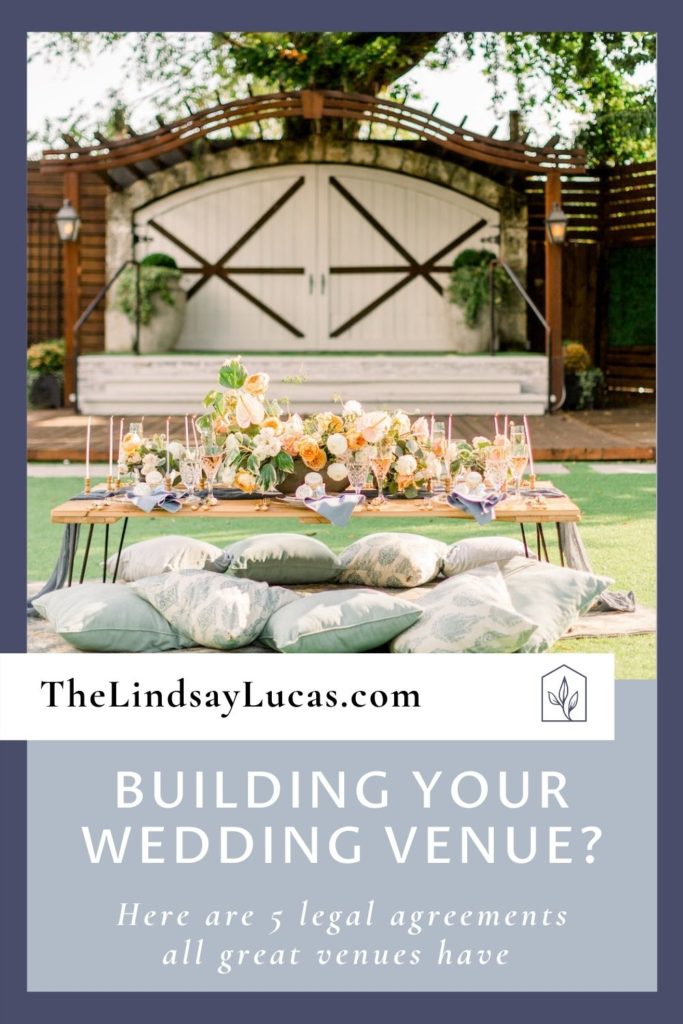 A table decorated for the bride and groom on the lawn of a wedding venue overlaid with text that reads Building Your Wedding Venue? Here are 5 legal agreements all great venues have