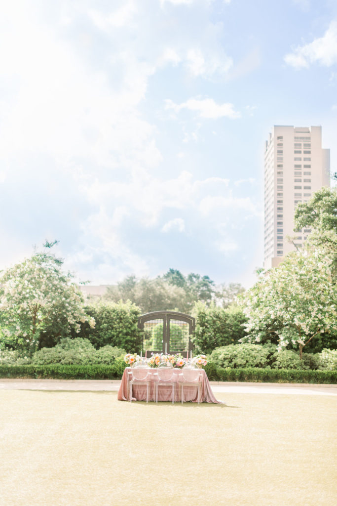 An image of an elegant newlywed table at a wedding venue.
